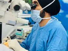 Surgical view of the eye during a glaucoma drainage procedure