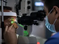 Retinal fundus image showing laser photocoagulation spots on the peripheral retina