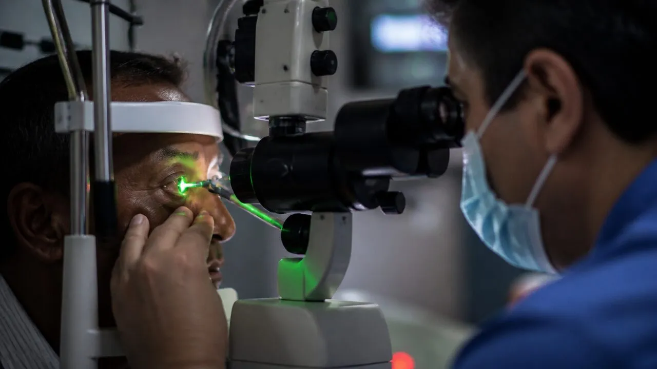 Retinal fundus image showing laser photocoagulation spots on the peripheral retina